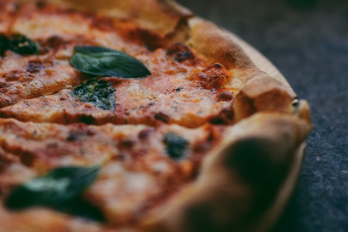 Wood-fired Italian pizza with fresh toppings, part of the menu at Merchant of Venice Leicester