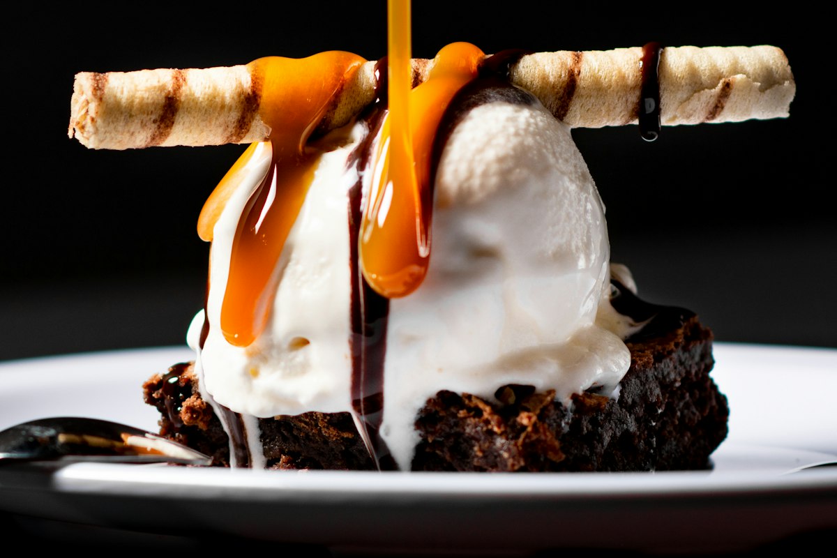 Indulgent dessert with caramel and ice cream, a fitting end to a romantic dinner at Merchant of Venice
