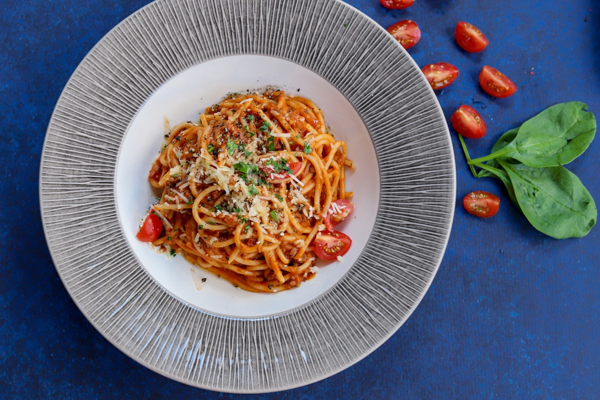 Freshly made Italian pasta dish with tomato sauce and parmesan, served at Merchant of Venice Patchings Art Centre
